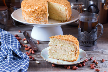 Slice of cake with peanuts