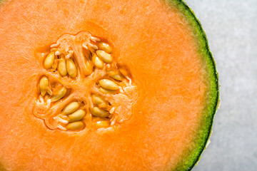 Half of melons, orange cantaloupe melon slice