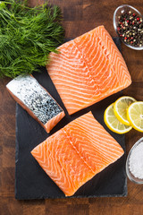 Raw salmon fillet with dill lemon olive oil salt and pepper © weyo
