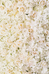 Obraz na płótnie Canvas Many artificial white roses, hydrangea, peonies flower as background and decoration, stock photo image
