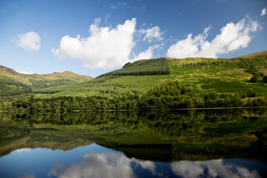 Wooded Hills and Reflections in a Scottish Loch