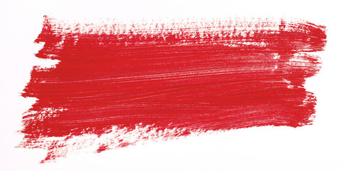 Red brush stroke isolated over white background