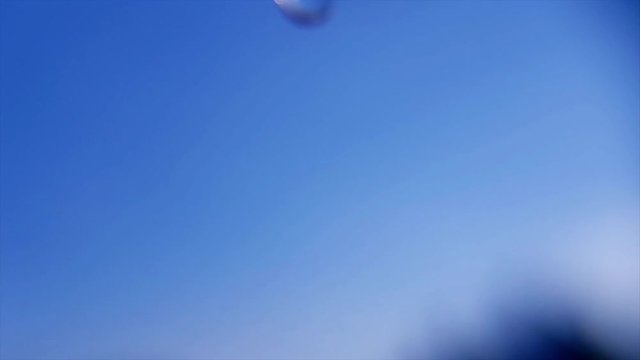 Small drops of water dripping from the window right after the rain. Shot this water drops in Macro at 240fps and reduced the speed 10 times in Premiere Pro.