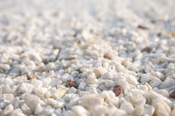 Small stone crumb white color with bokeh.