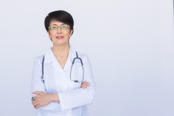 Doctor woman smile face with stethoscope over white background