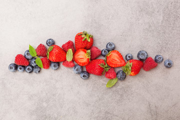 Delicious berries. Strawberries, blueberries and raspberries. Healthy summer fruits, antioxidants.