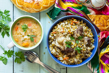 Eastern cuisine. Homemade Soup with bean mung and rice with bean mung and beef. Top view flat lay background.