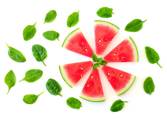 Creative layout with Watermelon slices and fresh basil and mint leaves isolated on white background. Summer concept. Flat lay, top view,