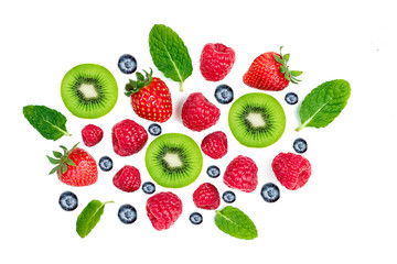 Fresh berries and kiwi fruits isolated on white background, top view. Mixed collection. Strawberry, Raspberry, Blueberry and Mint leaf, flat lay