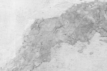 Wall fragment with scratches and cracks