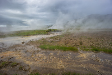 Iceland - Steaming ground and hot river at Geyser Strokkur