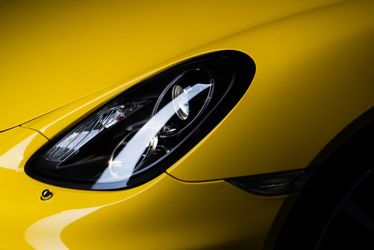 Car detailing series: Clean headlight of yellow sports car