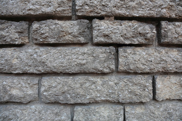 The idea of design embossed wall of an old textured bricks
