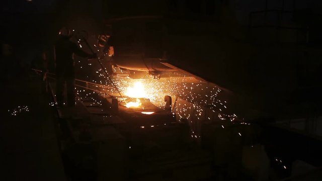 Steel billets at torch cutting