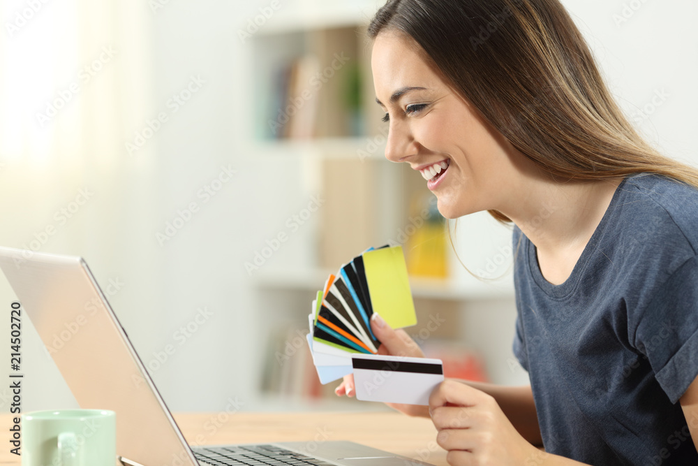 Wall mural shopper paying online with several credit cards