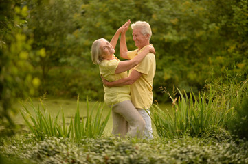 Fototapeta premium senior couple smiling dancing
