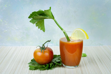 Tomato juice with celery close-up