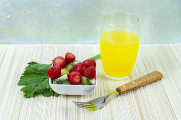 Variety of fruit and orange juice