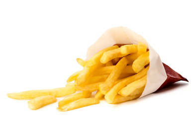 French fries spilled out and packaging on a white, isolated.