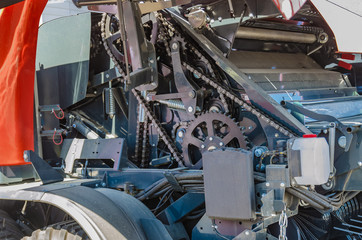 modern tractor for agriculture on the farm with a powerful motor, the flagship of the modern agricultural industry