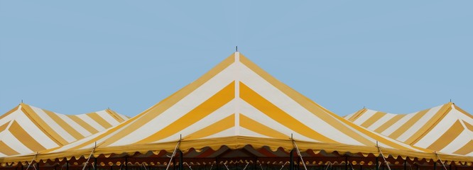 yellow and white stripe entertainment or wedding tent
