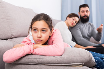 Parents lecturing daughter