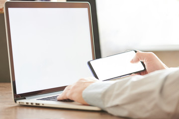 Close-up of hands holding smartphone
