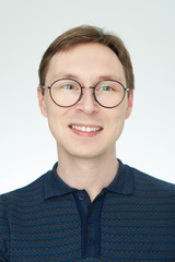 Portrait of young caucasian man in glasses