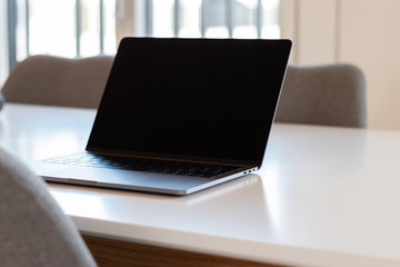 laptop mockup on white surface