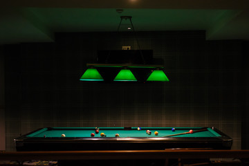 The pool table up lighted