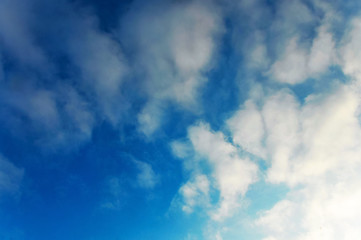 Spindrift clouds on blue sky