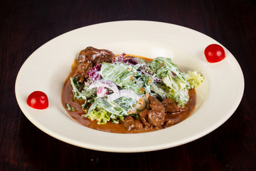 Beef with iceberg salad