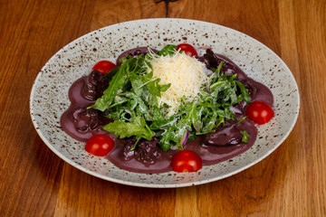 Liver salad with rucola