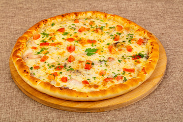 Seafood pizza with tomatoes