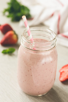 Strawberry Protein Smoothie in Bottle. Toned image