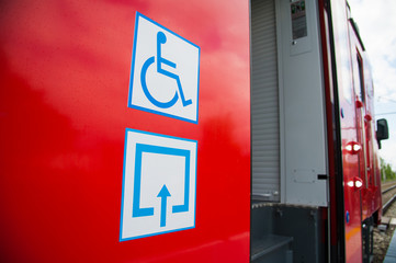 Red train in modern railway