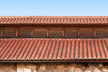 Red tile rooftop, closeup background.