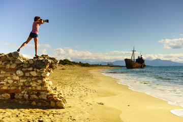 Tourist take photo on beach sea shore