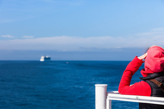 Tourist woman on liner seascape background