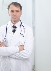 confident adult doctor looking at the camera.