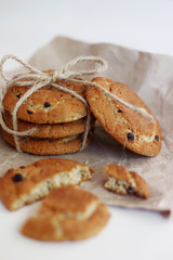 cookies with chocolate. oat cookies with bow on craft paper and light background