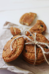 oat cookies with chocolateverikal viwe cookies with bow morning desert for milk. on light background