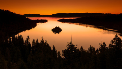 Fototapeta na wymiar Lake Tahoe West shore view in the sunrise overlooking Fannette Island and Emerald Bay