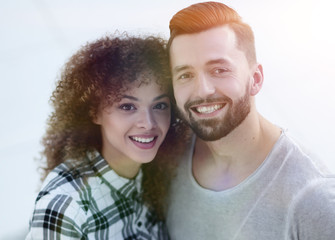 Fototapeta premium Top view modern young couple standing in new living room