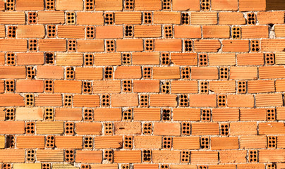 Clean red brick wall closeup, background/ texture.
