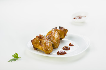 chicken wings with sesame on white background