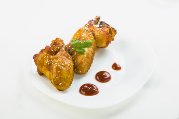 chicken wings with sesame on white background