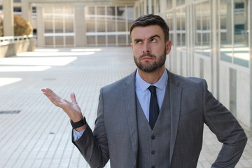 Fototapeta premium Funny businessman considering several options 