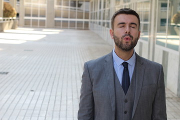 Fototapeta premium Businessman trying to calm down 