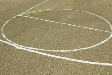 Basketball court on the asphalt. Close-up. Background. Texture.